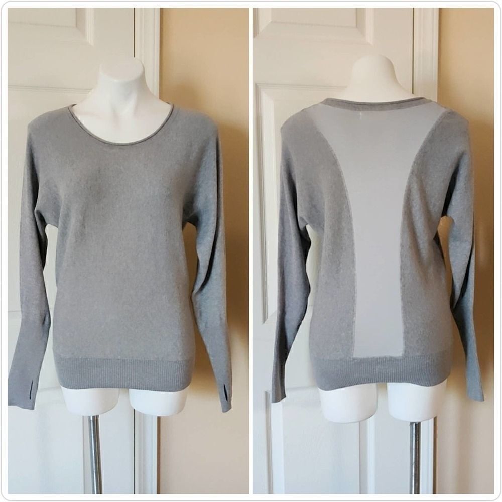 Akini dolman sleeve back panel sweater sz M